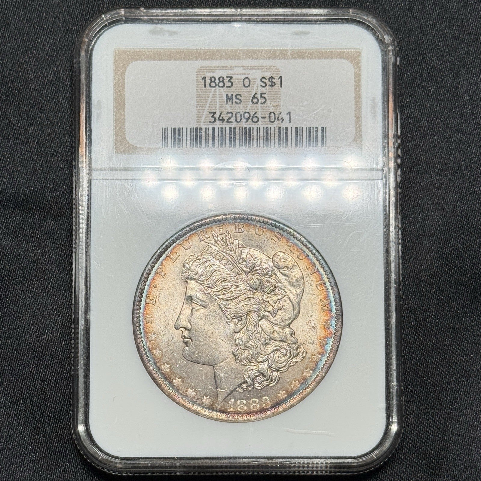 1883-O Morgan Silver Dollar NGC MS65 Rainbow Toning Peripheral Color GEM
