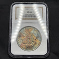 1885-O Morgan Silver Dollar NGC MS64 Rainbow Toned Colorful Original Toning